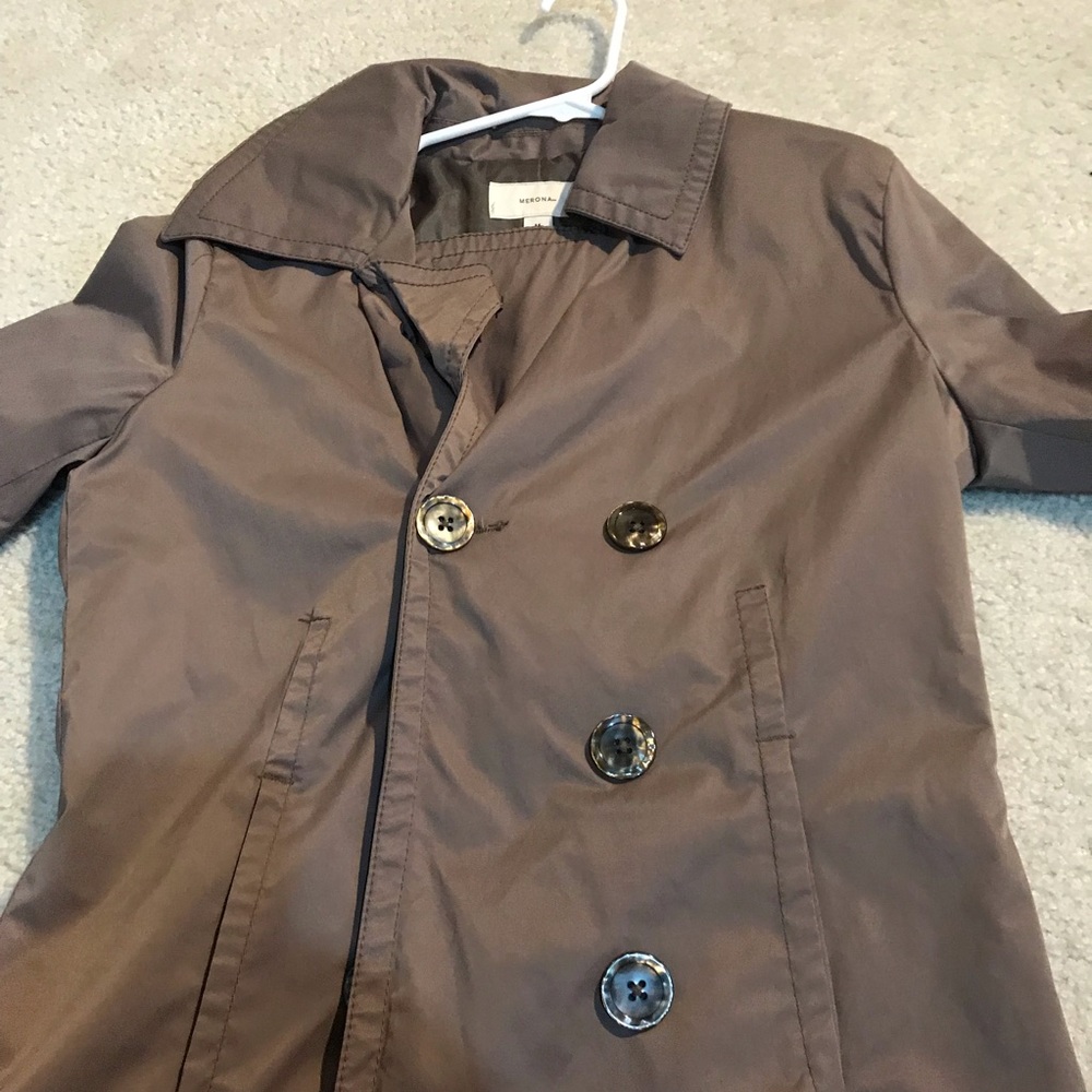 Tan rain coat
